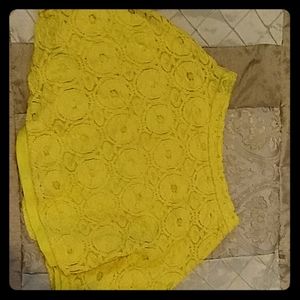 A bright yellow mini skirt